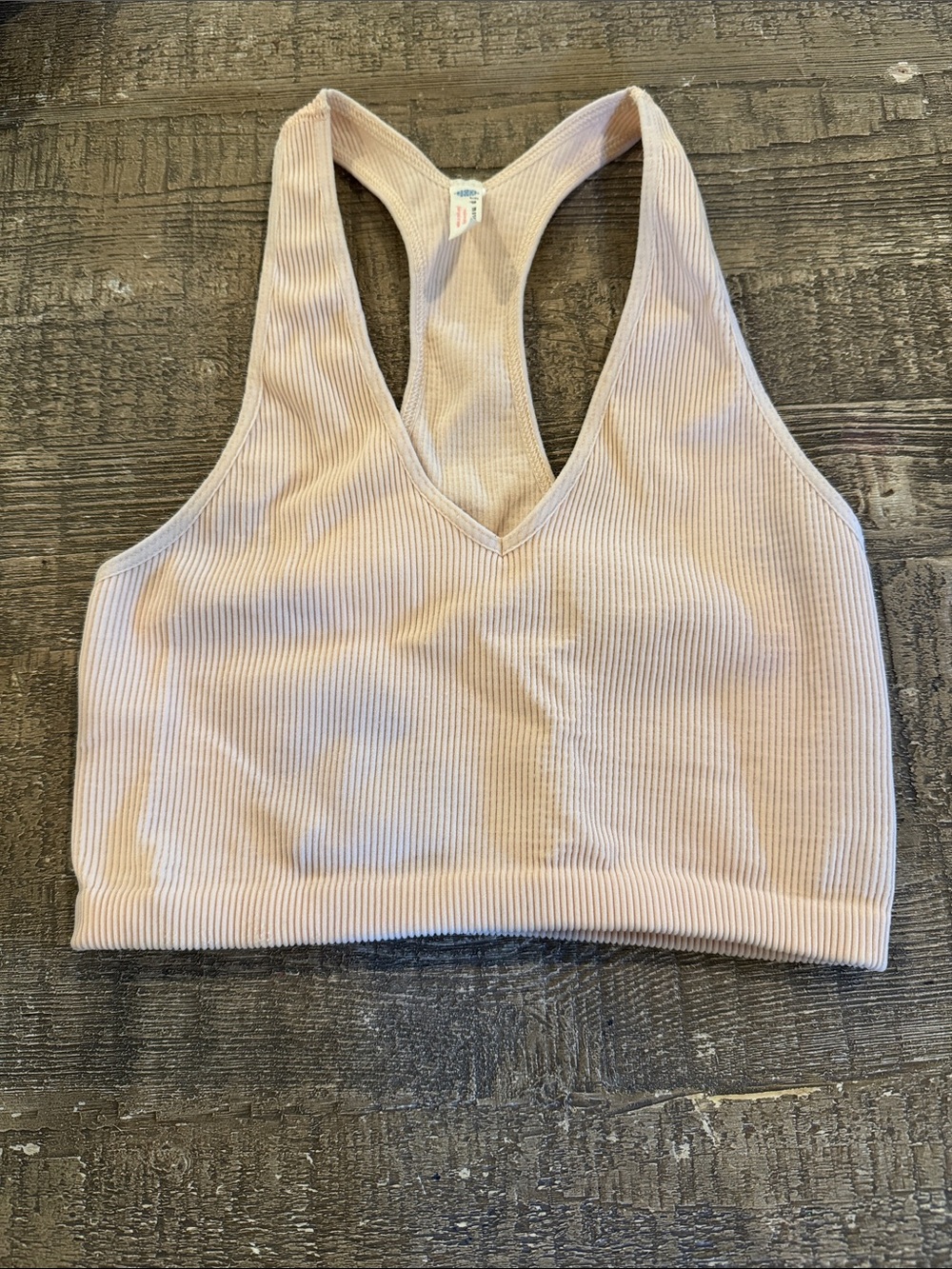 FP movement ribbed bralett in a peachy cream color